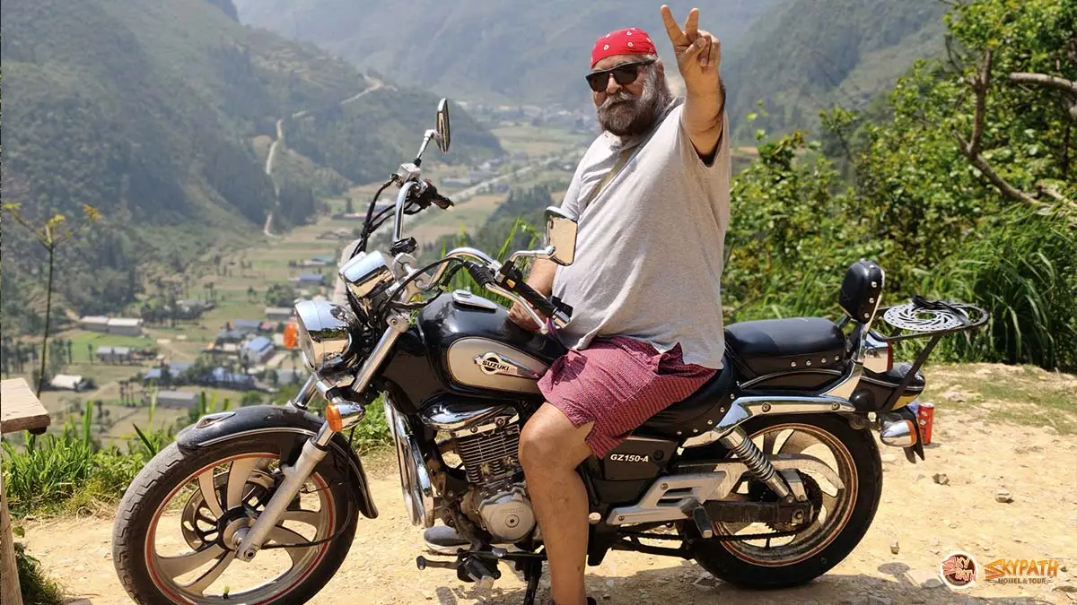 Travelers riding through the mountains on a 2 day Ha Giang Loop