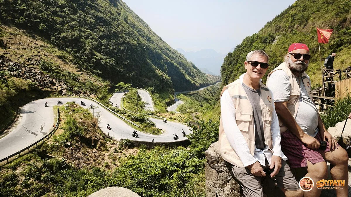 Motorbike riders exploring the Ha Giang Loop tours through Ma Pi Leng Pass